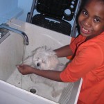 Jittaun helps Penny take a bath after making "paw print art"!