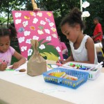 Momo and Nini participate in our Think Art! mural and Installation at A Day in Our Village 2011