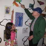 Sydney and her Grandfather at the "Art in the Air" youth art show opening May 2011