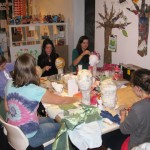 Youth Art Mentor Amy Zangrilli works with the teen Art Space class 2011