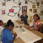 Youth art mentor Mindy Fisher works with participants for our "Art in the Air" Installation