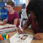 Vivienne and Jittaun working on their art during one of our Artist Inspired Workshops at "The Candy Store" Pop-Up Gallery