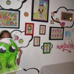 Natalie loves the art by Naomi Martinez (monstrochika)! She created a large monster sticker to join the others on the studio wall.