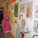 Greta finds her art on the wall at the WSMS opening reception on 12/9/2011