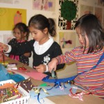 Liea, Aria and Elanor create some art during the WSMS art opening on 12/9/2011